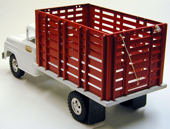 Rear side of a 1958 Tonka Farms Stock Rack #32 with Corral and Animals
